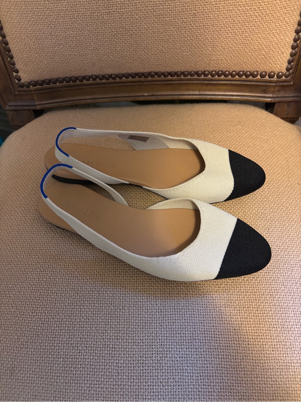 Rothy's Cream Slingback Flats with Black Cap Toe